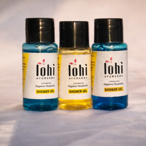 IMAGE CONTAINS THREE BOTTLES OF SHOWER GEL ONE IS GOLDEN, AND THE OTHER TWO BESIDE IT ARE BLUE.